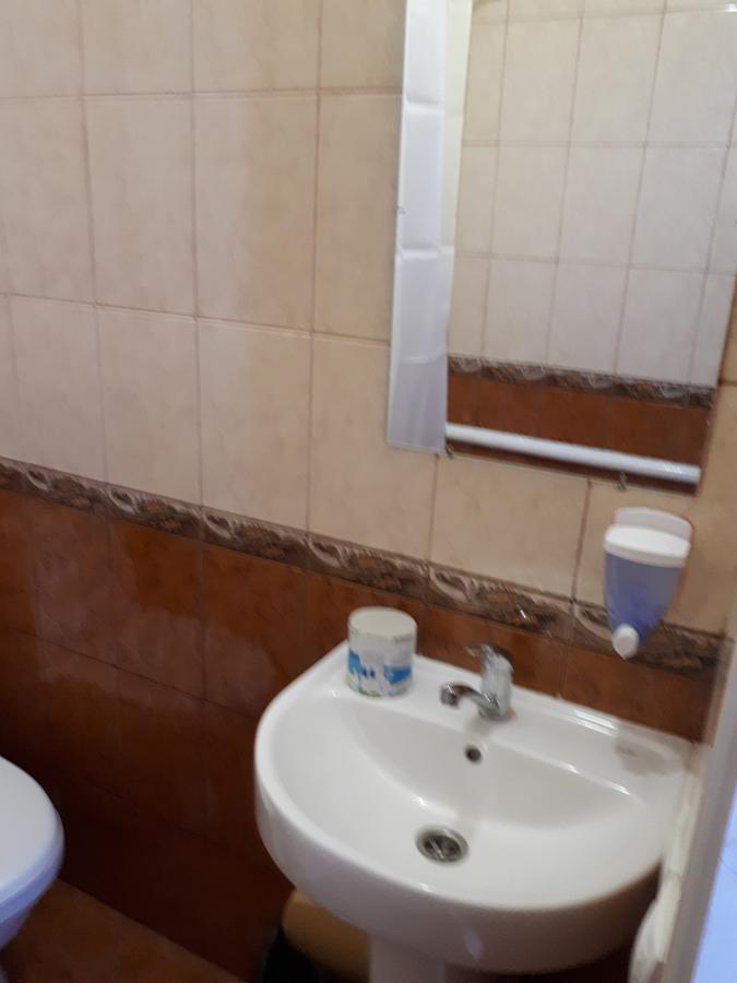 Hotel Gostynnyi Dvir Sharhorod Стая снимка